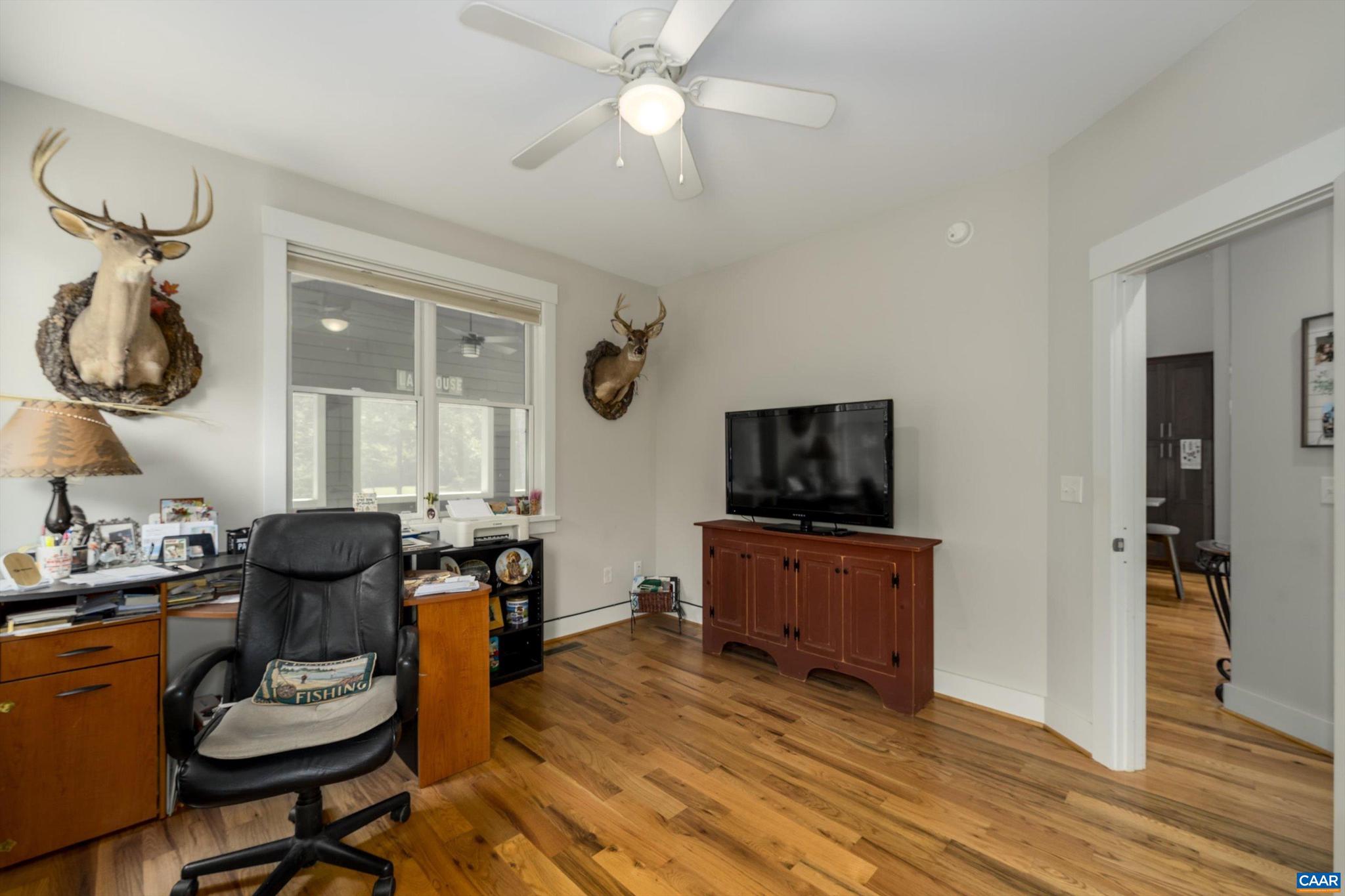 336 Bear Run Road Stanardsville, VA 22973 - Photo 31 of 67 a living room with furniture and a flat screen tv