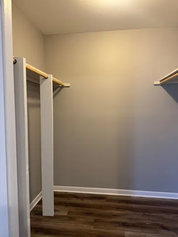 a view of small space with wooden floor