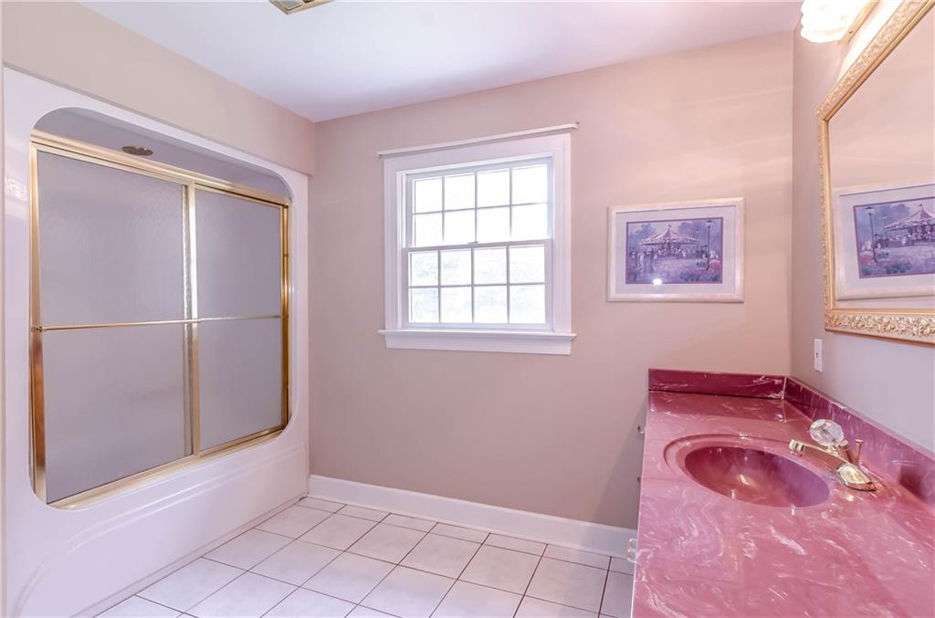 6673 Jenkins Road Morganton, NC 28655 - Photo 13 of 32 a view of an empty room with window and closet
