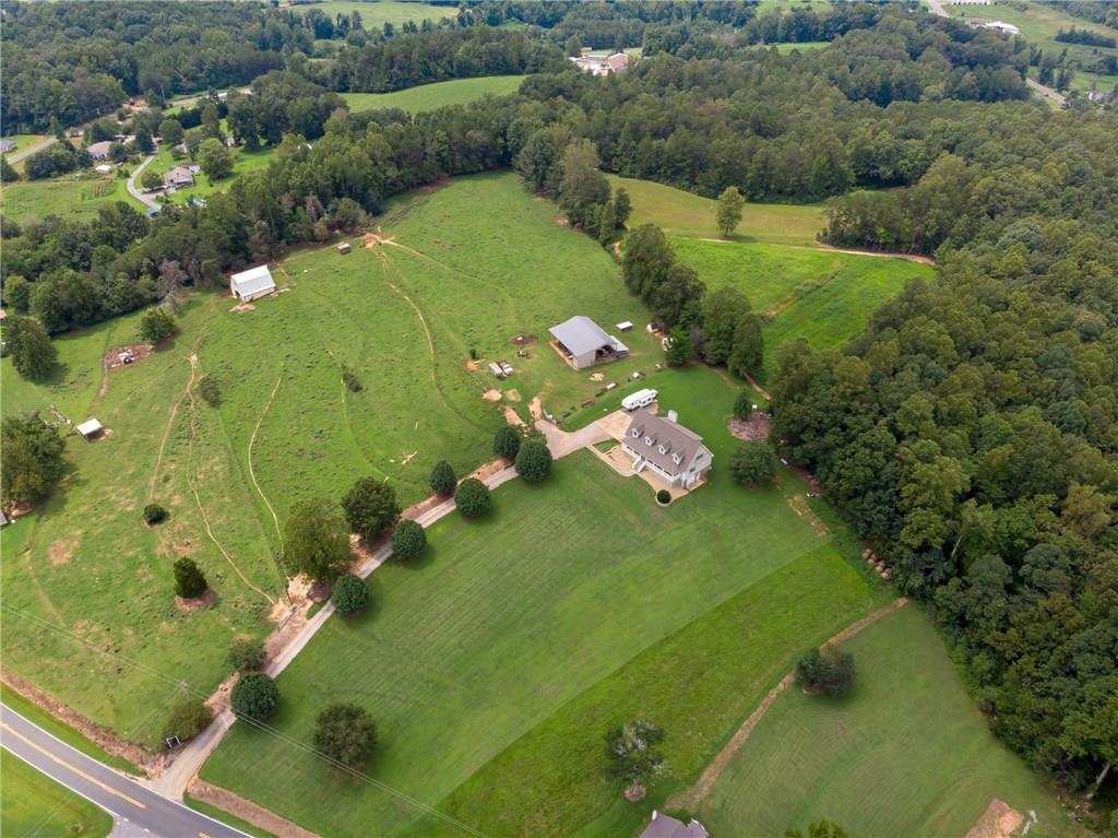 6673 Jenkins Road Morganton, NC 28655 - Photo 28 of 32 a view of a lake with a yard