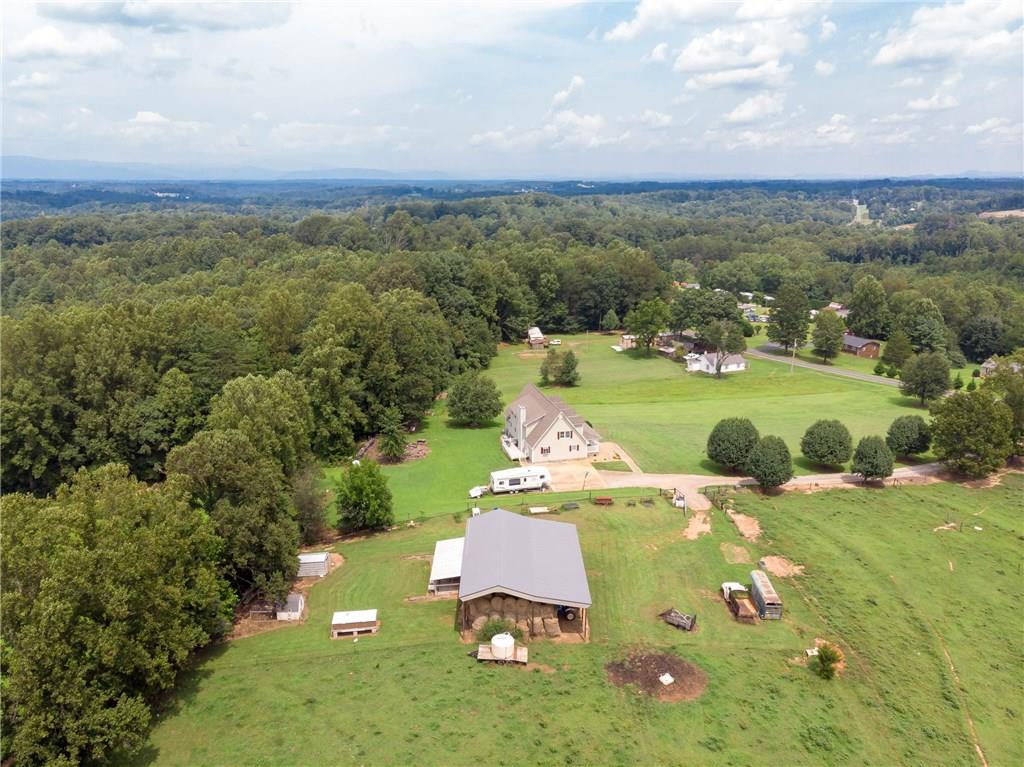 6673 Jenkins Road Morganton, NC 28655 - Photo 31 of 32 an aerial view of a house with yard