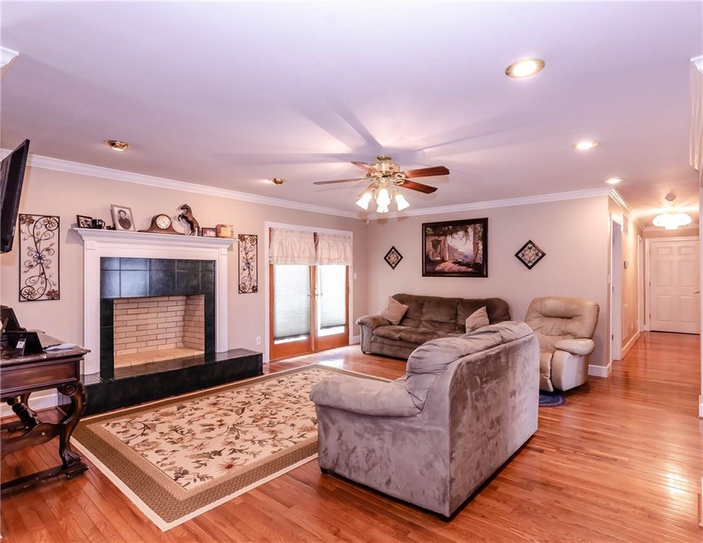 6673 Jenkins Road Morganton, NC 28655 - Photo 8 of 32 a living room with furniture and a fireplace