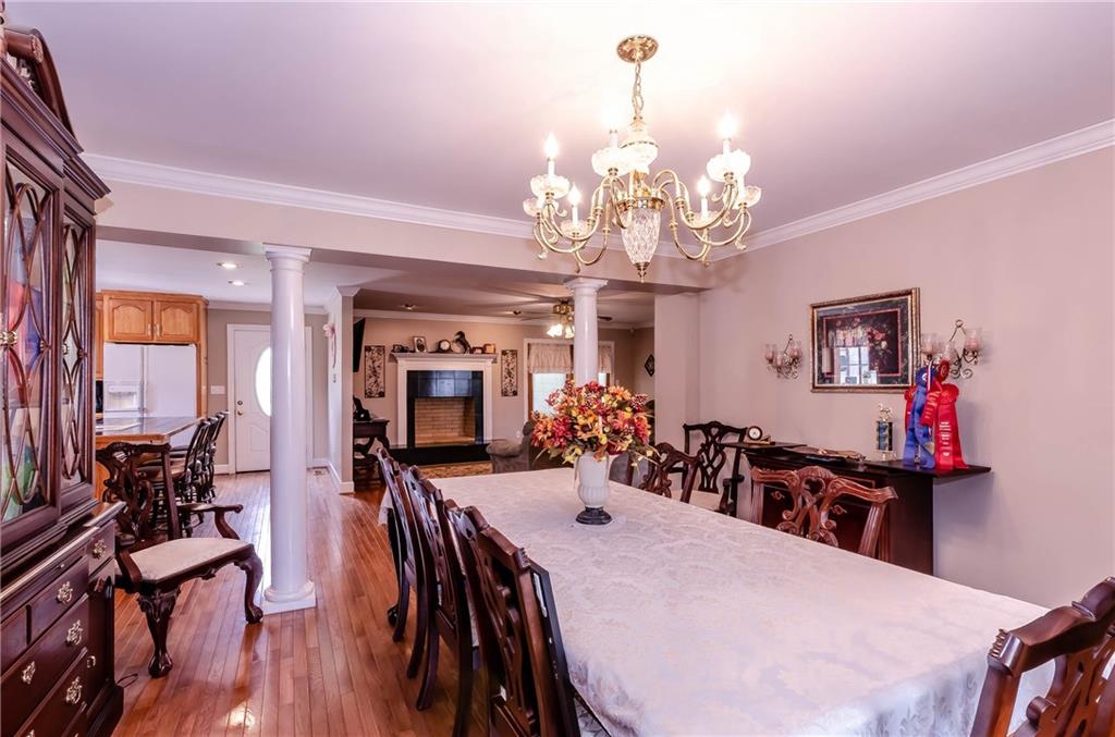 6673 Jenkins Road Morganton, NC 28655 - Photo 9 of 32 a view of a dining room with furniture and chandelier
