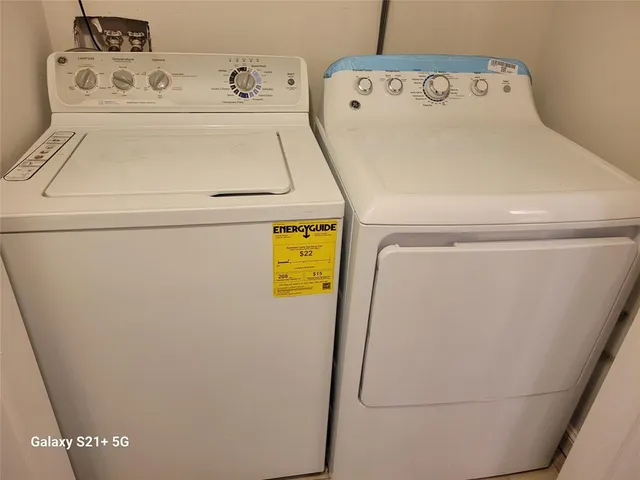 a utility room with dryer and washer
