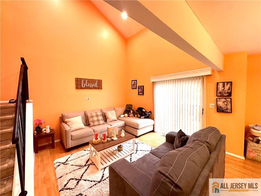 173 Salem Road North Brunswick, NJ 08902 - Photo 6 of 16 a living room with furniture and a window