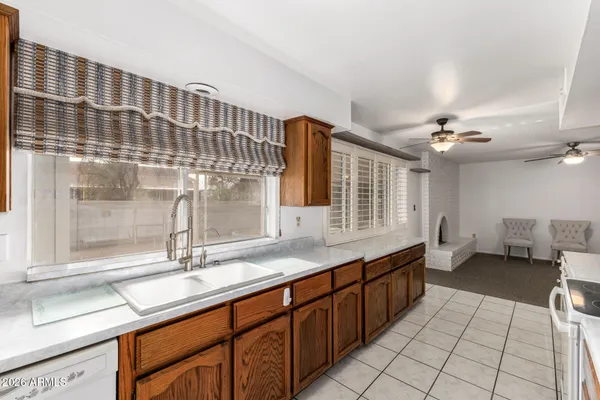 a bathroom with a sink double vanity and a mirror
