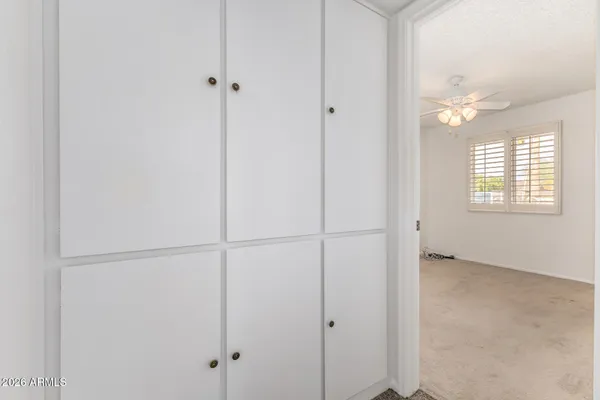 a view of an empty room with a window