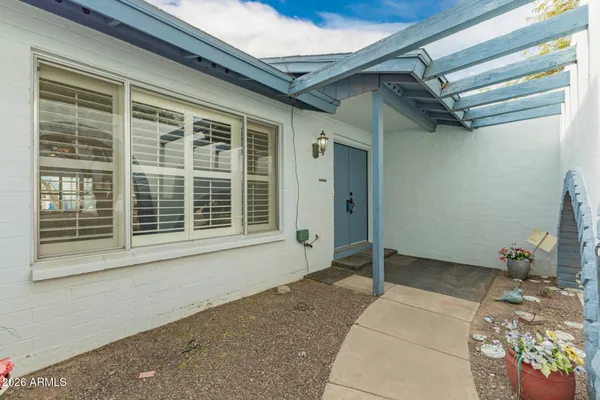 a view of a house with a wooden door