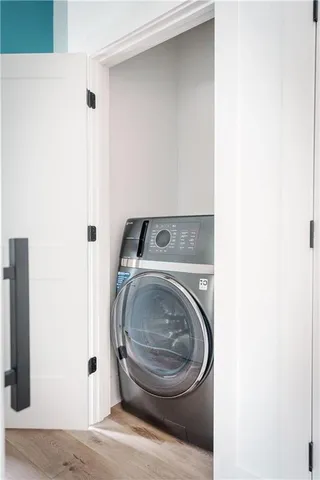 a utility room with dryer and washer