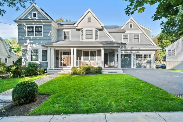 front view of a house with a yard