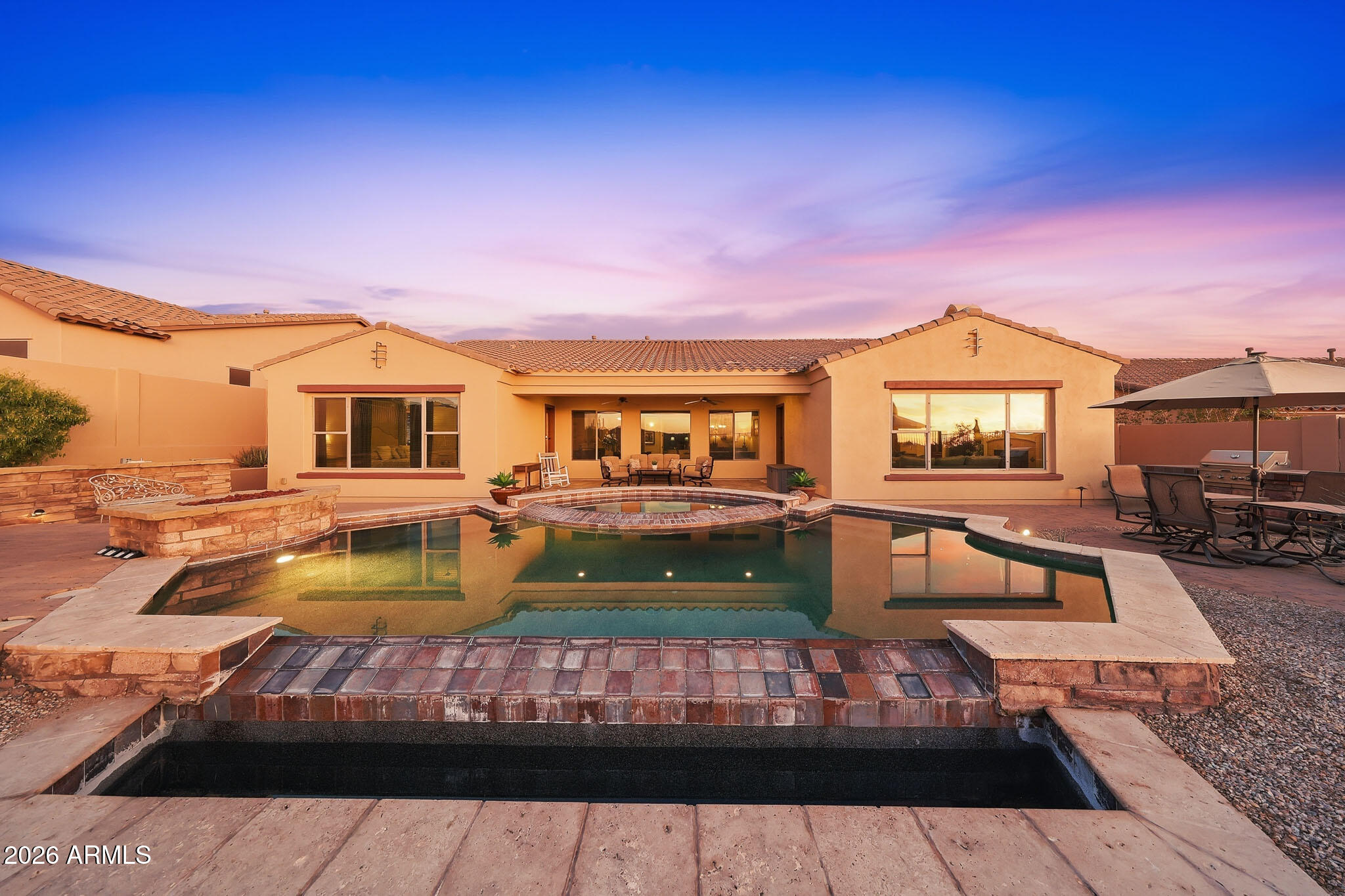 18174 West Narramore Road Goodyear, AZ 85338 - Photo 26 of 35 infinity-edge pool and spa