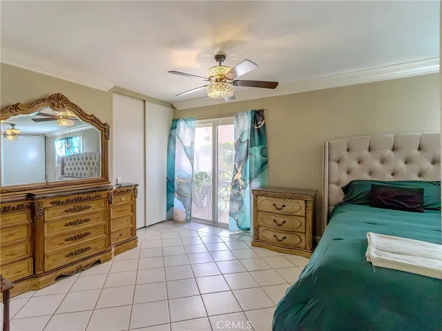 a spacious bathroom with a double vanity sink and a mirror