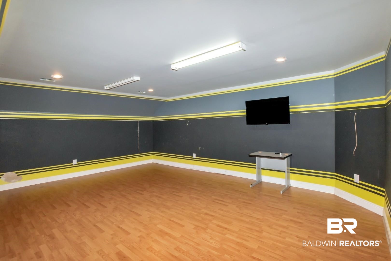 2640 Meadowlake Road Semmes, AL 36575 - Photo 33 of 55 Unfurnished room featuring light wood finished floors, recessed lighting, ornamental molding, and a baseboard heating unit