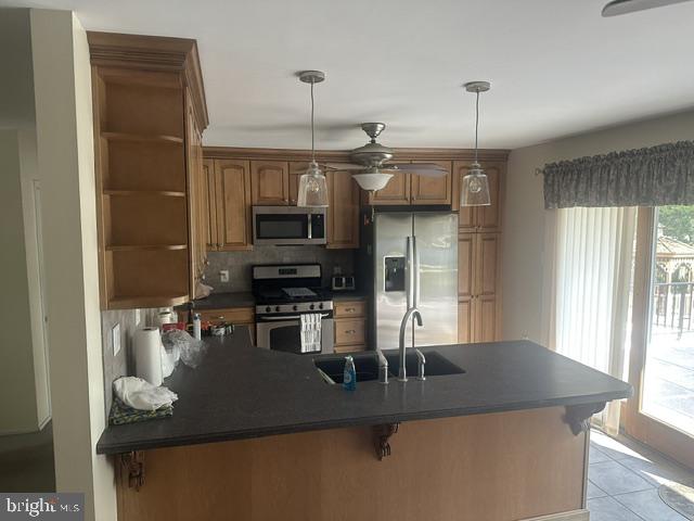 215 Hancock Road North Wales, PA 19454 - Photo 8 of 25 Modern kitchen with warm wood accents.