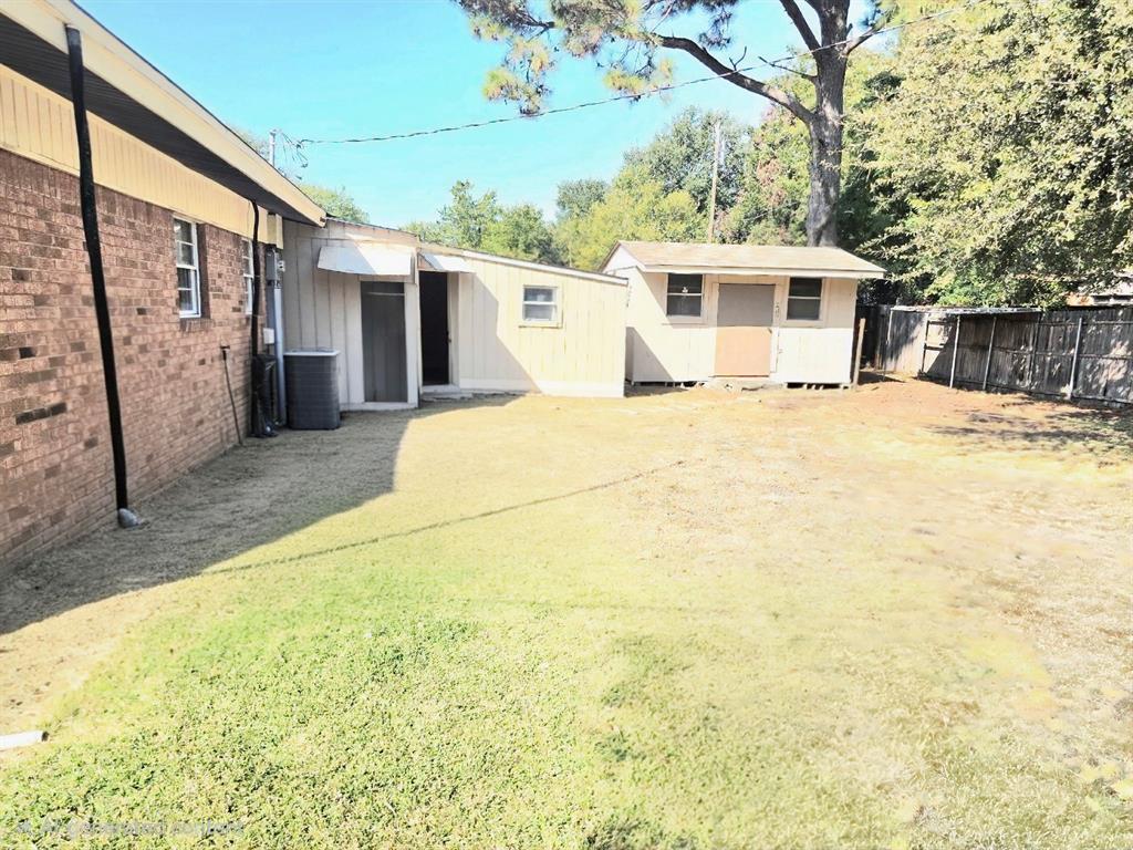 1513 Arcady Lane Irving, TX 75061 - Photo 15 of 20 a view of a house with a backyard