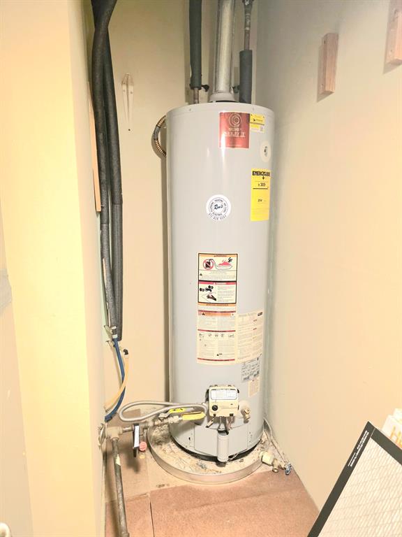 1513 Arcady Lane Irving, TX 75061 - Photo 17 of 20 a bathroom with a granite countertop sink and a mirror