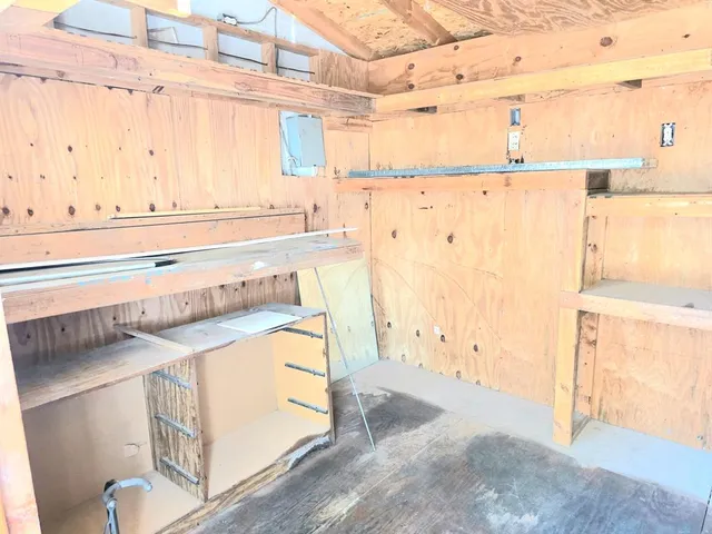 a view of a bathroom with a sink and a window