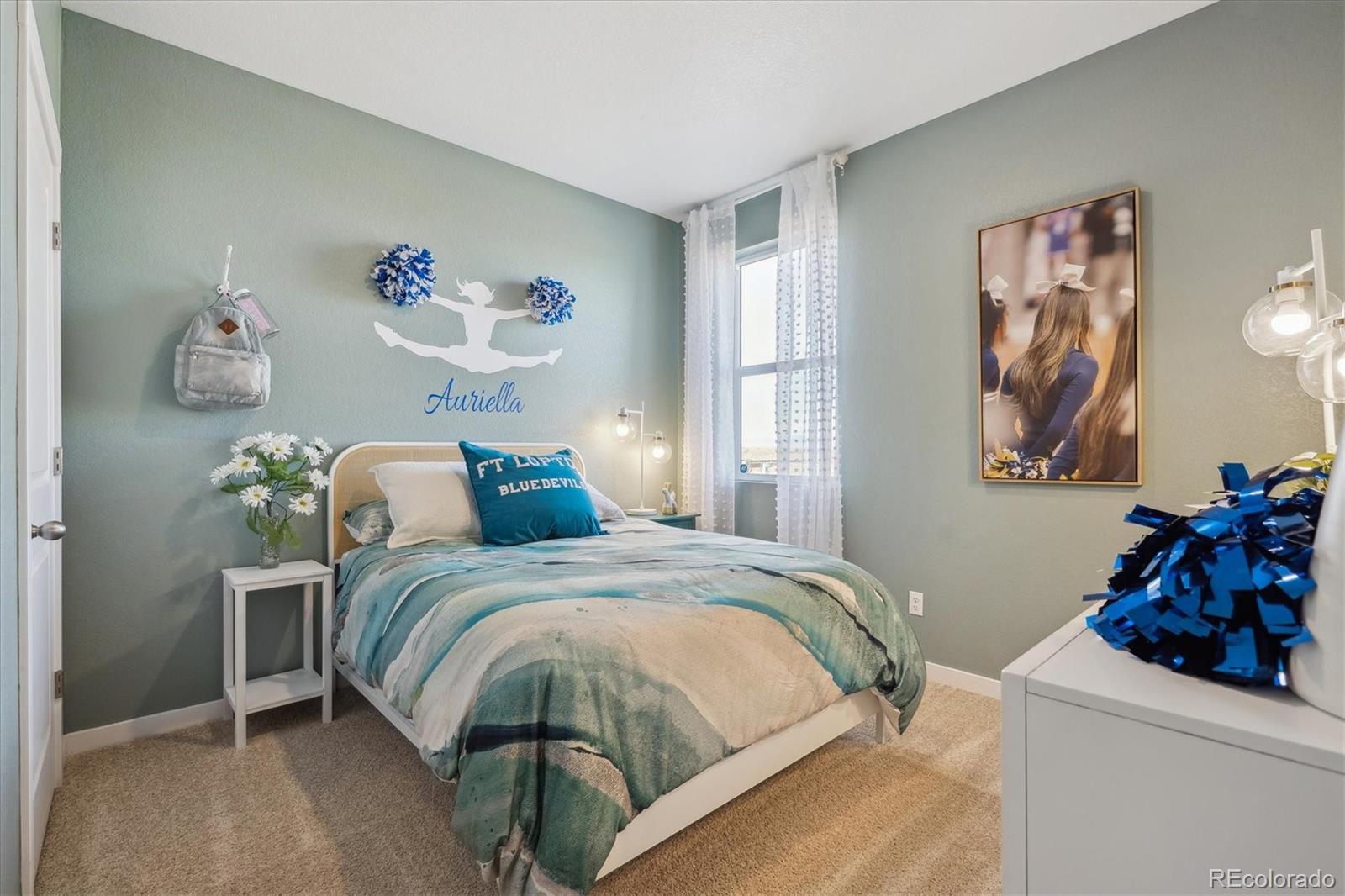 2303 Base Street Fort Lupton, CO 80621 - Photo 7 of 28 a bedroom with a bed and a window