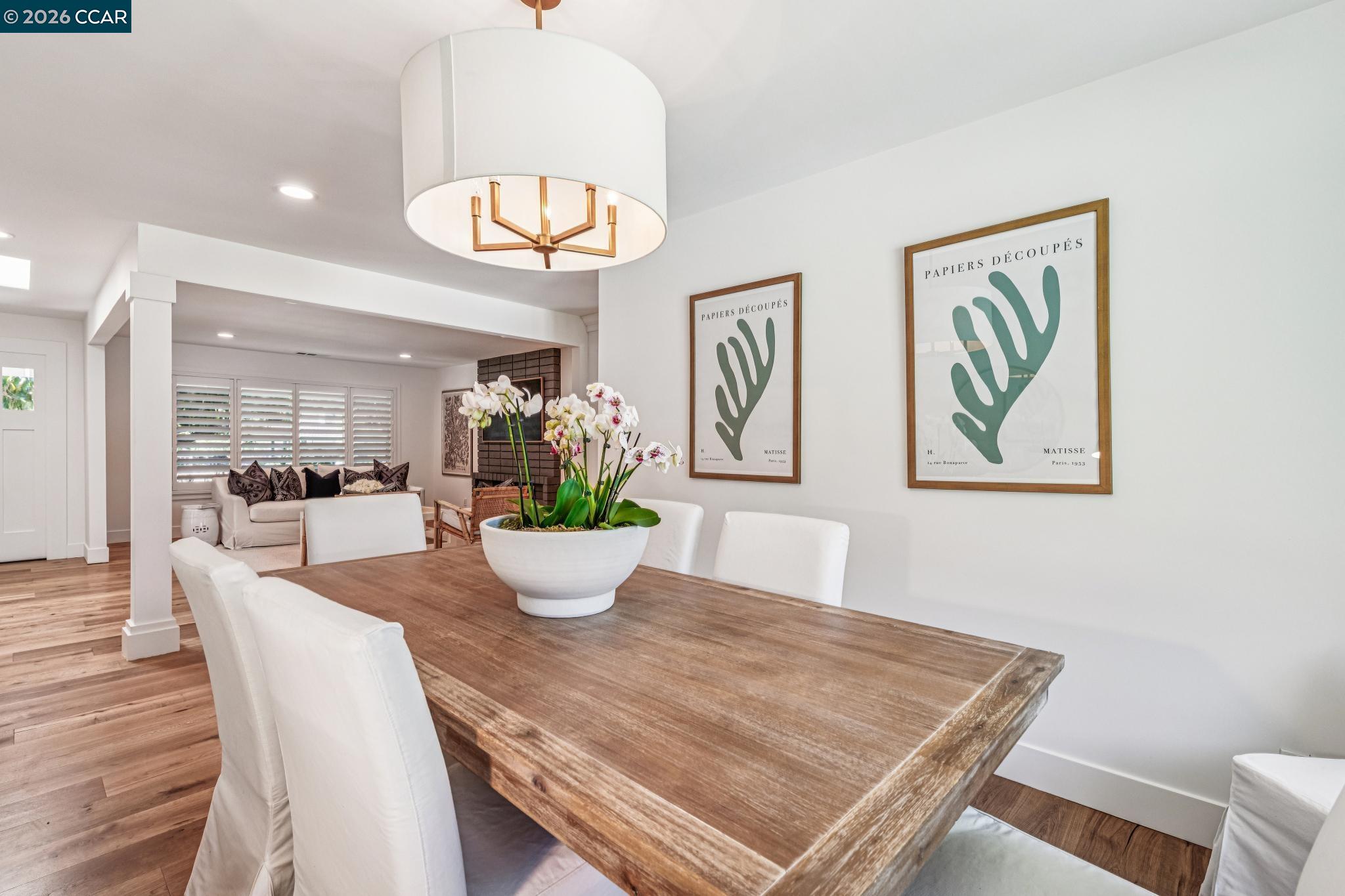 2941 Roundhill Road Alamo, CA 94507 - Photo 15 of 83 a view of a dining room with furniture and wooden floor