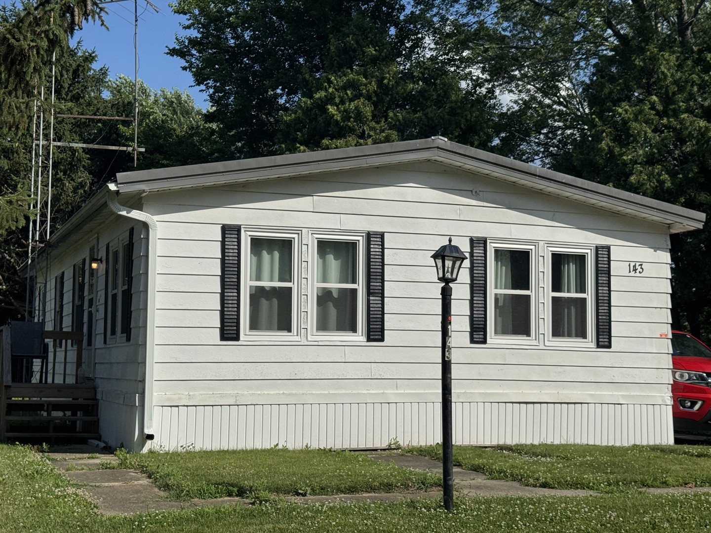 16 West Wasson Road Amboy, IL 61310 - Photo 2 of 13 a view of a house with a yard