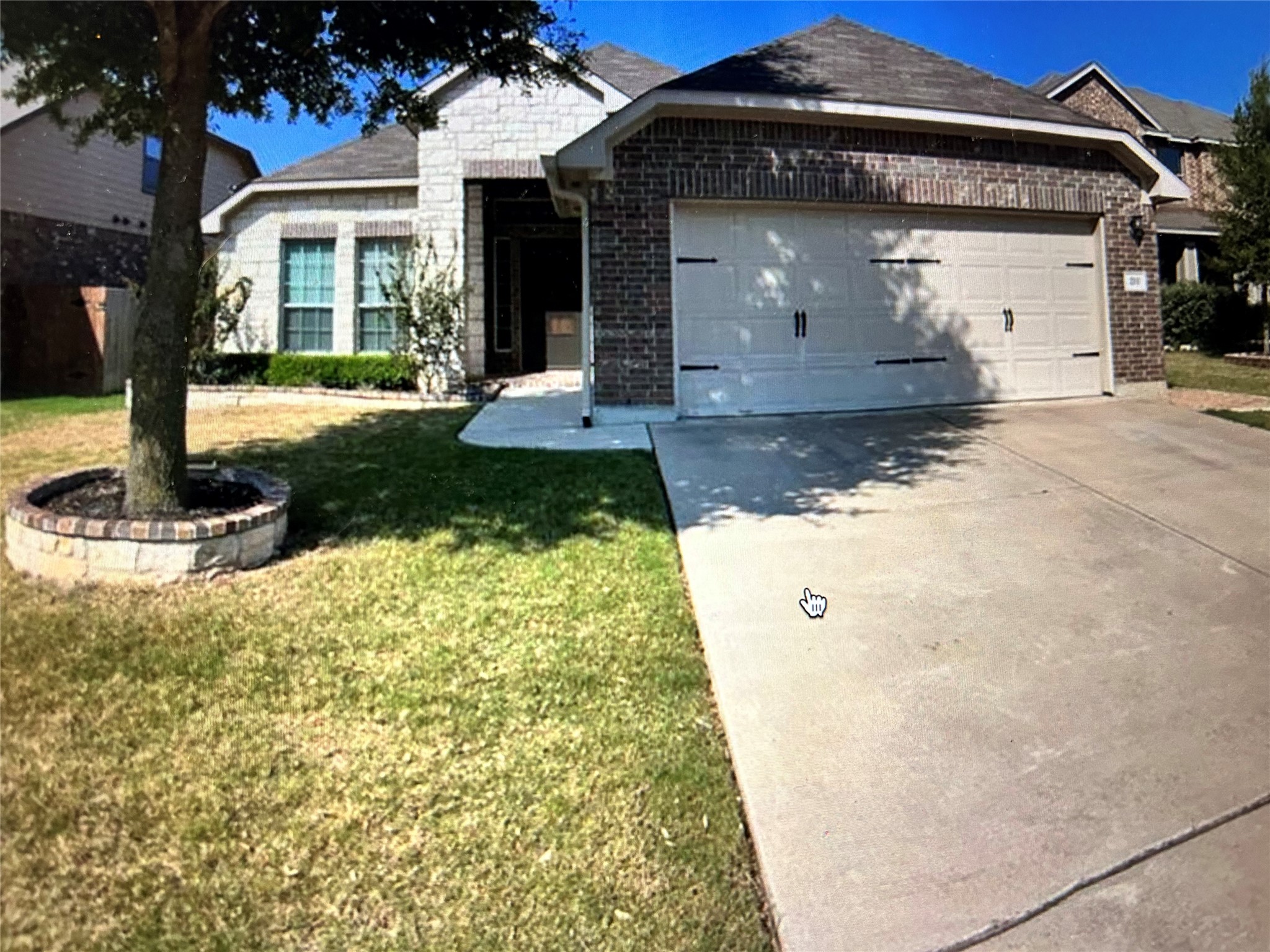 211 Animas Drive Georgetown, TX 78626 - Photo 2 of 25 a front view of a house with garden