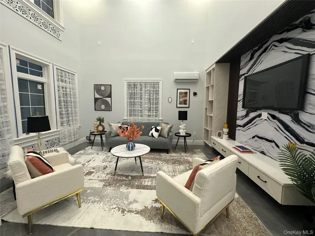 a bed room with a bed and a chair