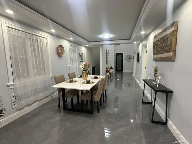 a view of an empty room with windows