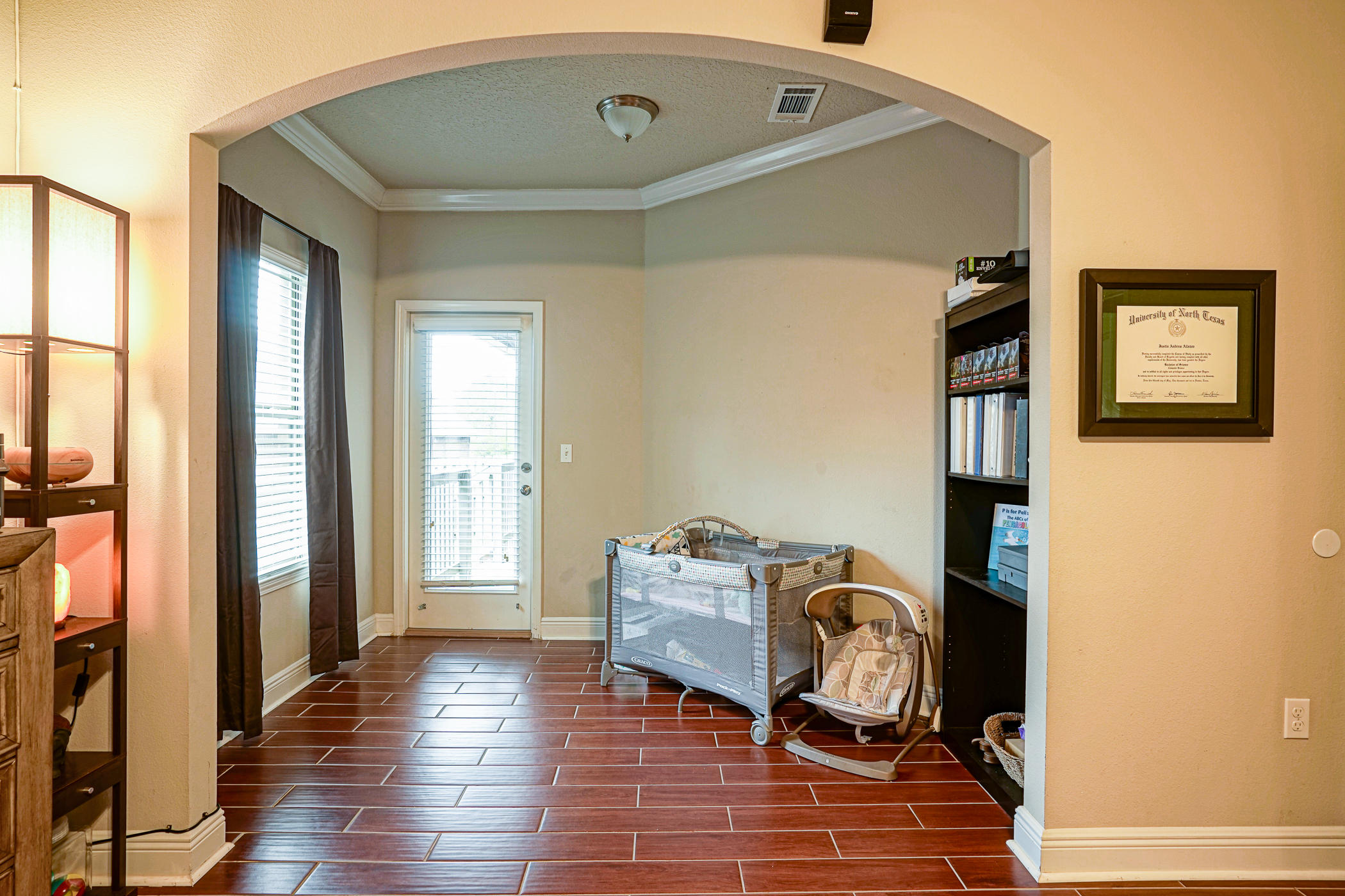 631 Red Fern Road Crestview, FL 32536 - Photo 13 of 23 a room with couch and wooden floor