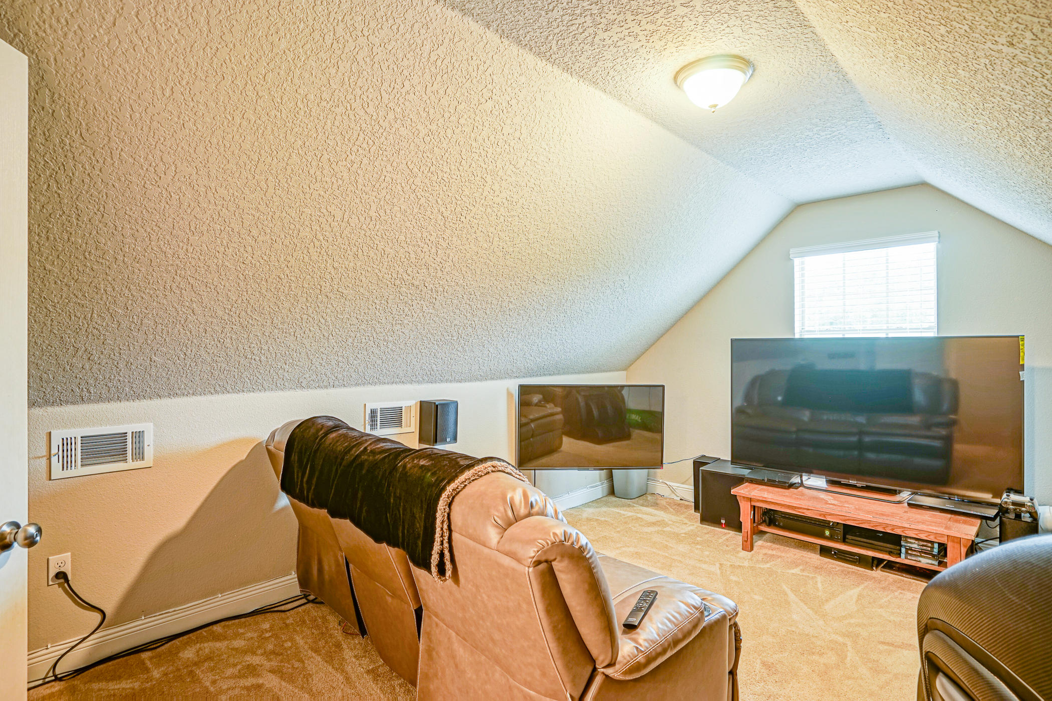 631 Red Fern Road Crestview, FL 32536 - Photo 19 of 23 a living room with furniture and a flat screen tv
