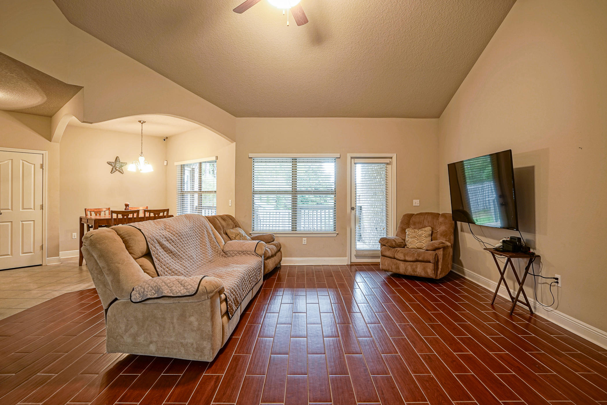 631 Red Fern Road Crestview, FL 32536 - Photo 8 of 23 a living room with furniture and a flat screen tv