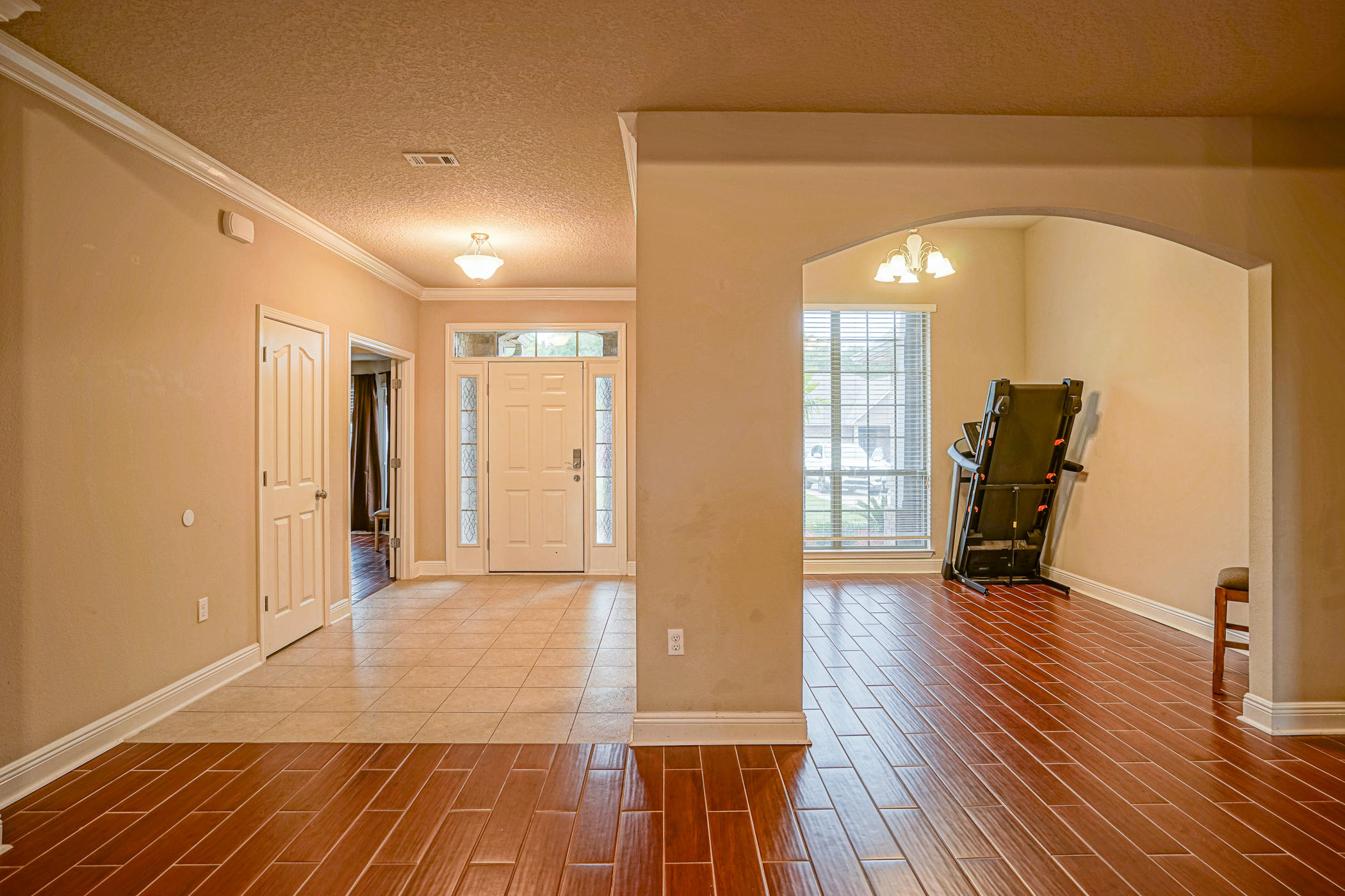 631 Red Fern Road Crestview, FL 32536 - Photo 10 of 23 a view of empty room with wooden floor