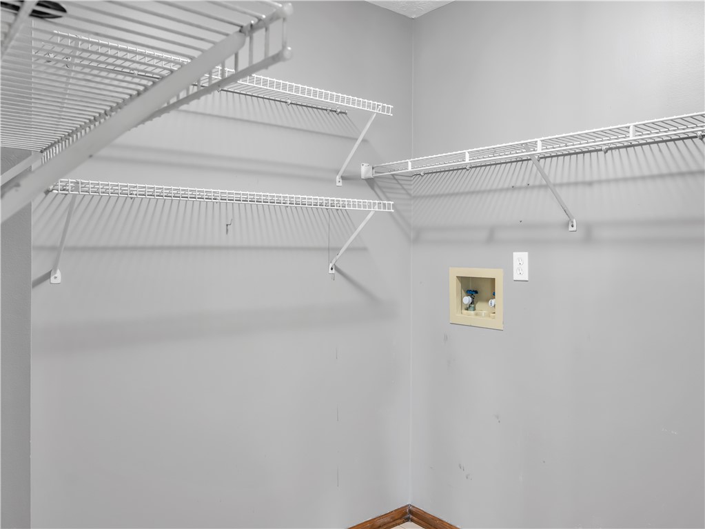 25 Callaway Springboro, OH 45066 - Photo 16 of 51 This dedicated laundry space offers practical storage and hookups for appliances.