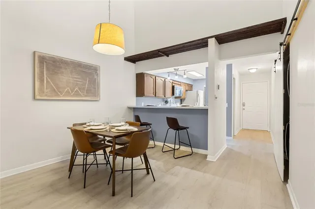 a view of a livingroom with furniture and a fireplace