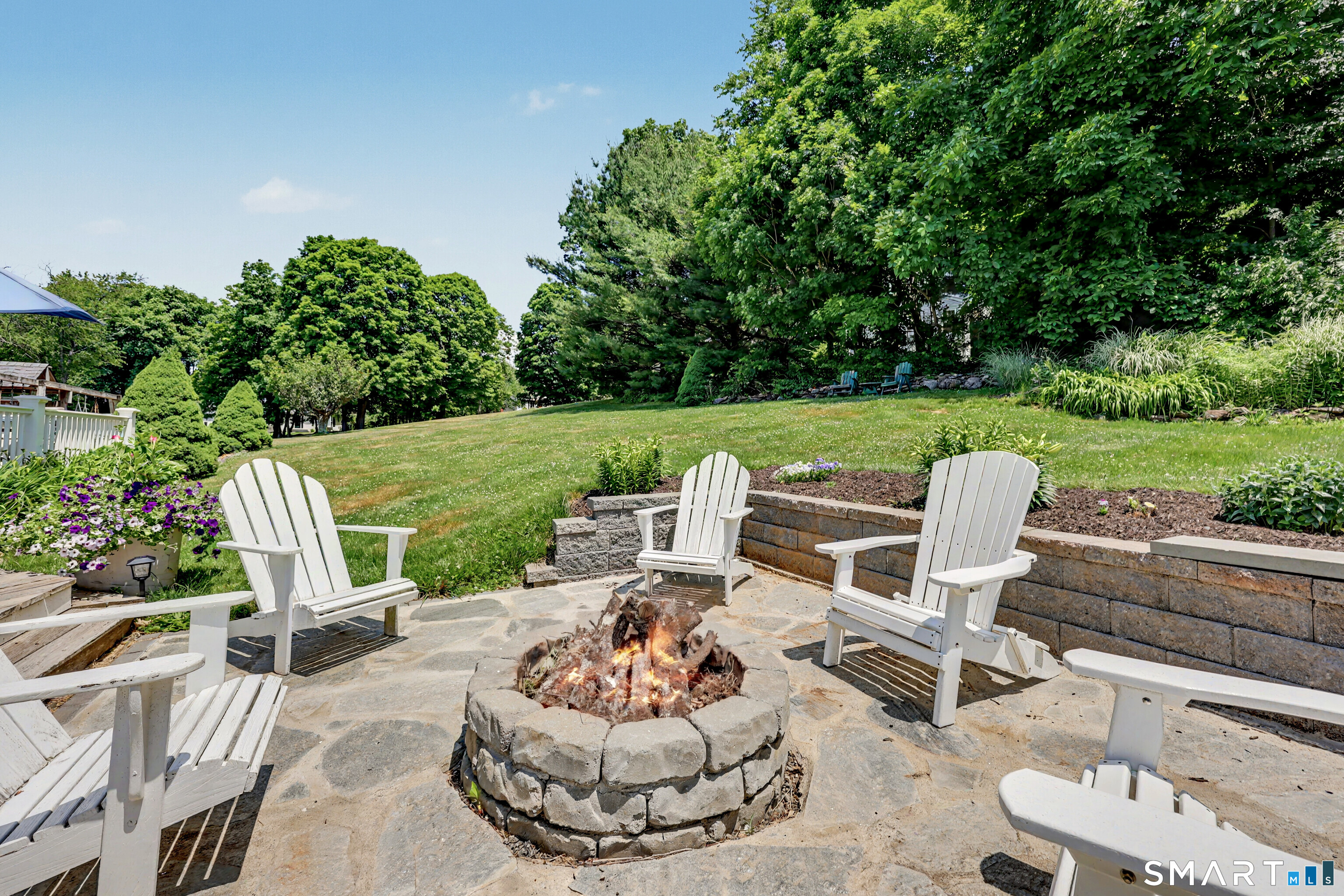 29 Pleasant View Road New Milford, CT 06776 - Photo 6 of 40 Continue enjoying the outdoors into fall with your cozy firepit
