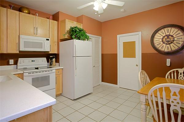 51 Anderson Street, Unit 1 Boston, MA 02114 - Photo 3 of 6 a kitchen with a refrigerator a stove top oven a sink and dishwasher