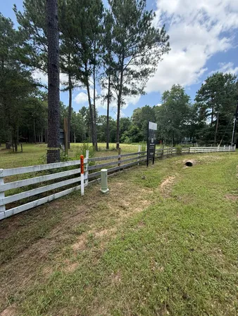 a view of a park with swings and slides