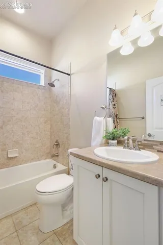 a bathroom with a sink a toilet and a bathtub