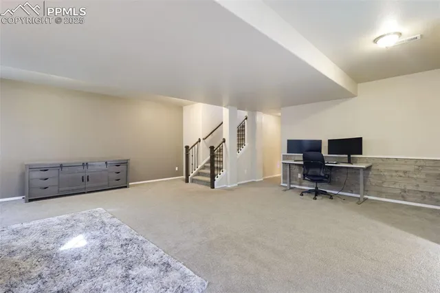 a view of a livingroom with furniture