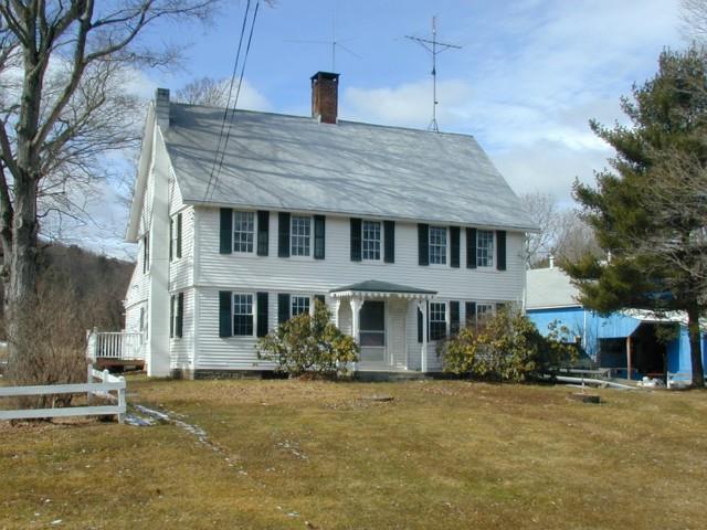 3 Botsford Hill Road Roxbury, CT 06783 - Photo 1 of 1 a front view of a house with a garden