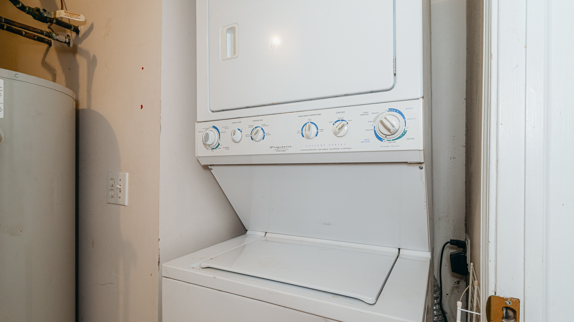 2319 West Harrison Street, Unit 4 Chicago, IL 60612 - Photo 23 of 25 a utility room with dryer and washer