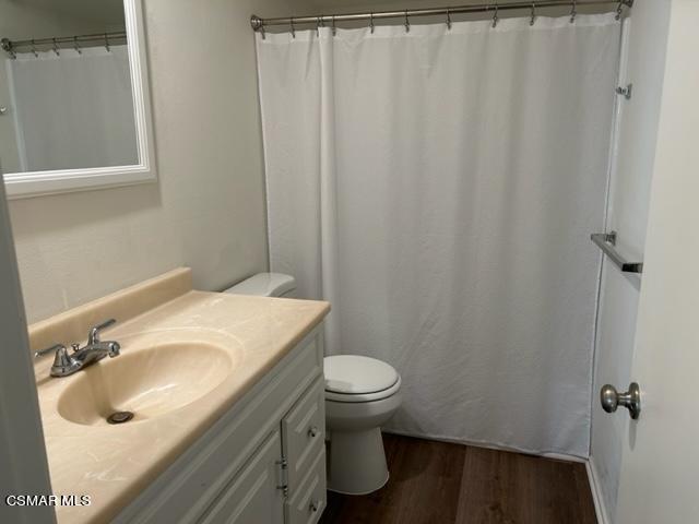 1724 Sinaloa Road, Unit 125 Simi Valley, CA 93065 - Photo 8 of 17 a bathroom with a sink and toilet