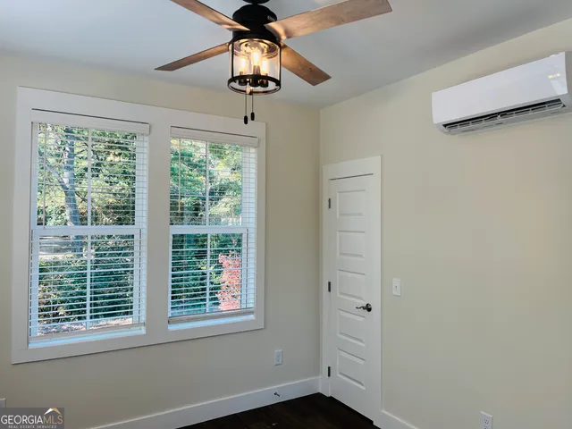a view of front door and bedroom