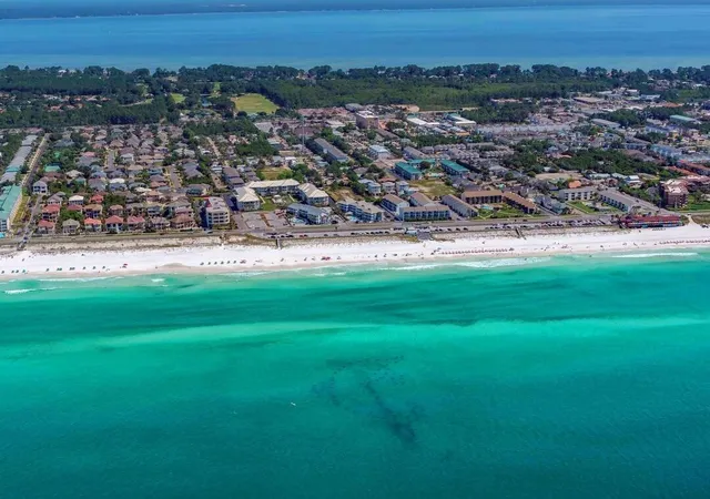 a view of a swimming pool with chairs
