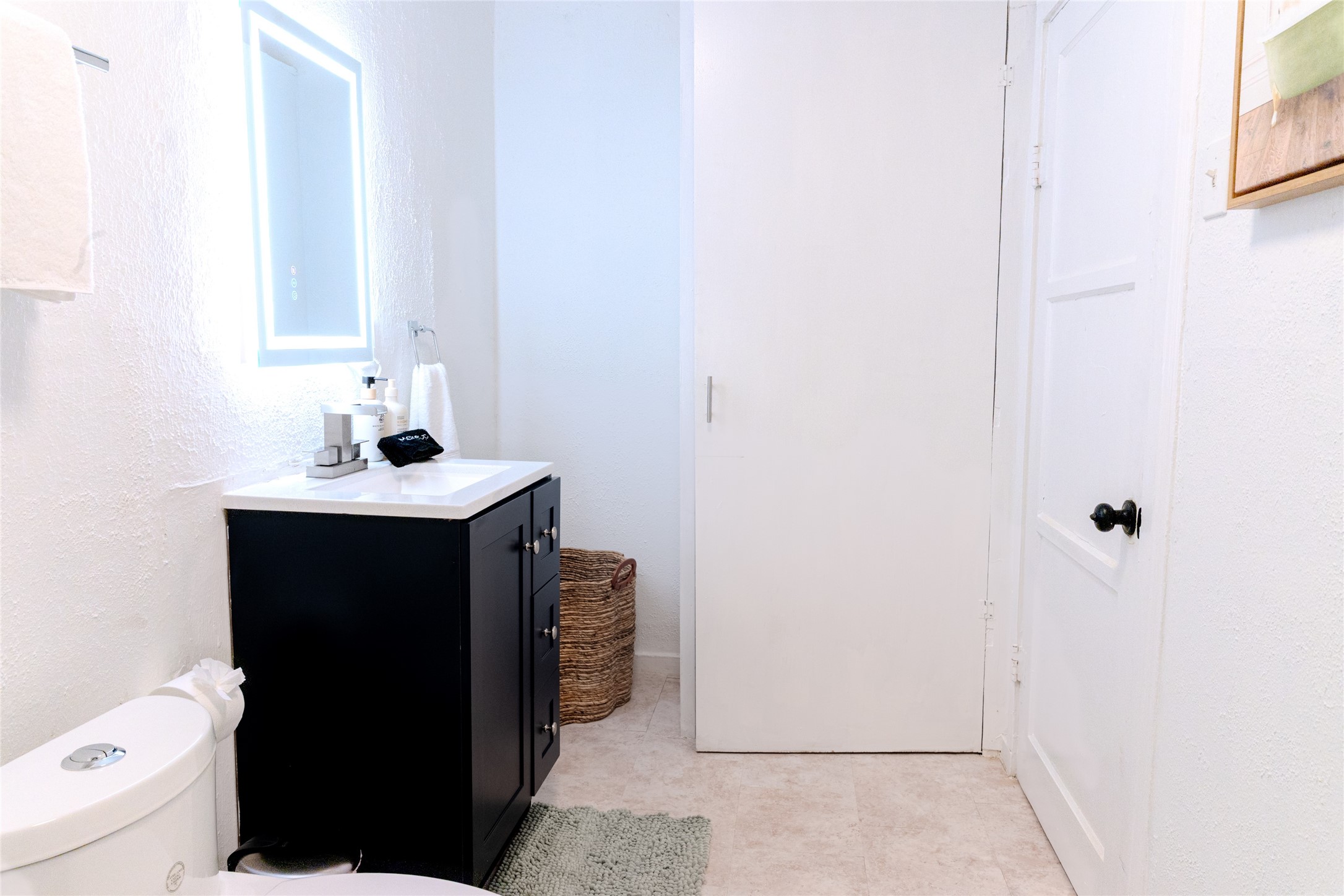 2016 Dunlavy Street, Unit 3 Houston, TX 77006 - Photo 19 of 22 a bathroom with a sink and a toilet
