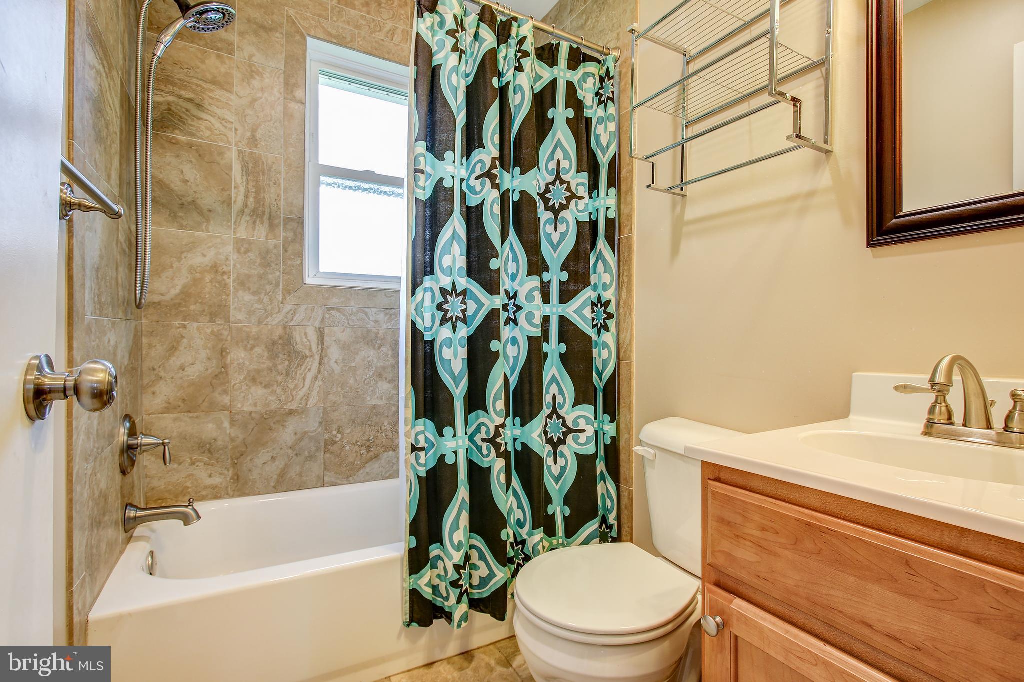 12001 Prices Distillery Road Damascus, MD 20872 - Photo 20 of 28 Full Bath with ceramic floor and vanity