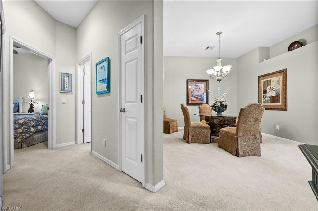 28531-f B F B Fowler Court Bonita Springs, FL 34135 - Photo 24 of 34 a view of a livingroom with furniture and a chandelier