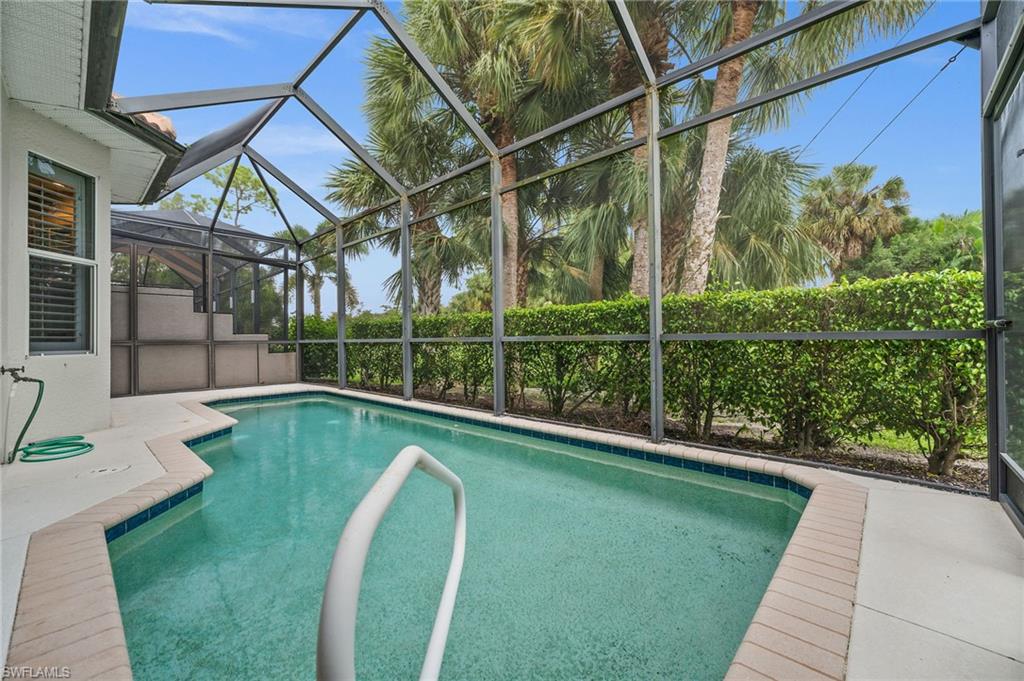 28531-f B F B Fowler Court Bonita Springs, FL 34135 - Photo 30 of 34 a view of a house with a backyard