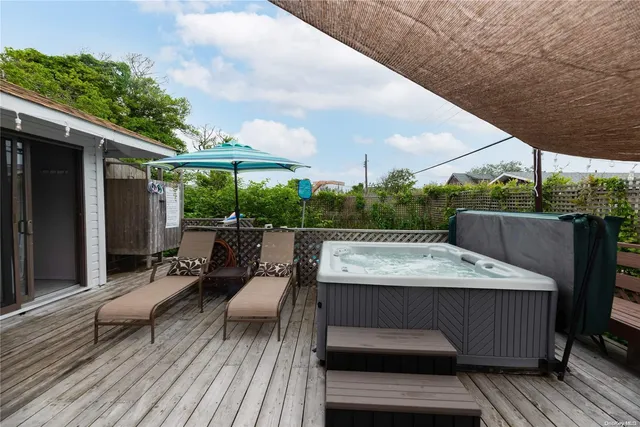 a view of roof deck with patio