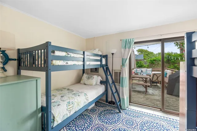 a bed room with a bed and a table