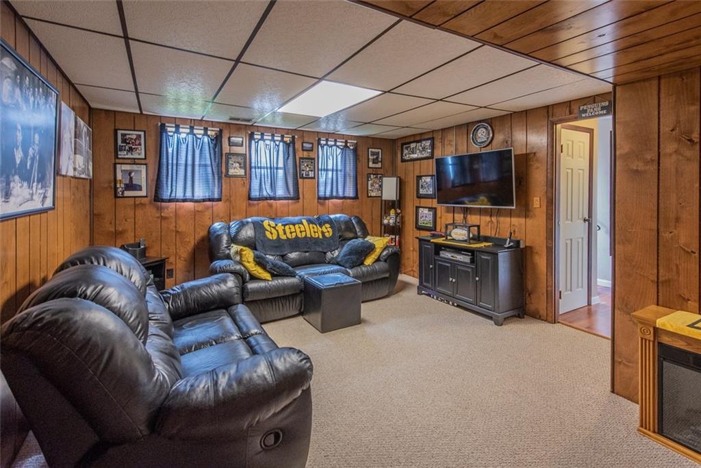 1657 O'Block Road Pittsburgh, PA 15239 - Photo 18 of 24 Finished gameroom is a great place to catch your favorite sports team!